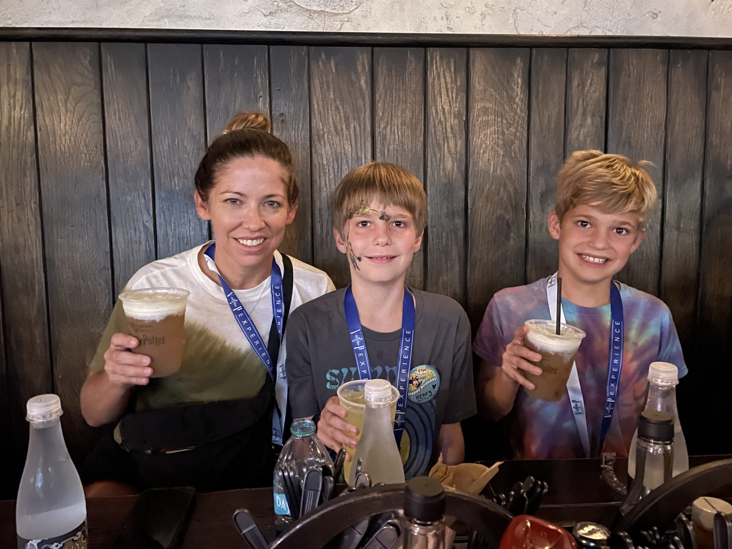 Dr Brownfield and sons having lunch at Hogsmead