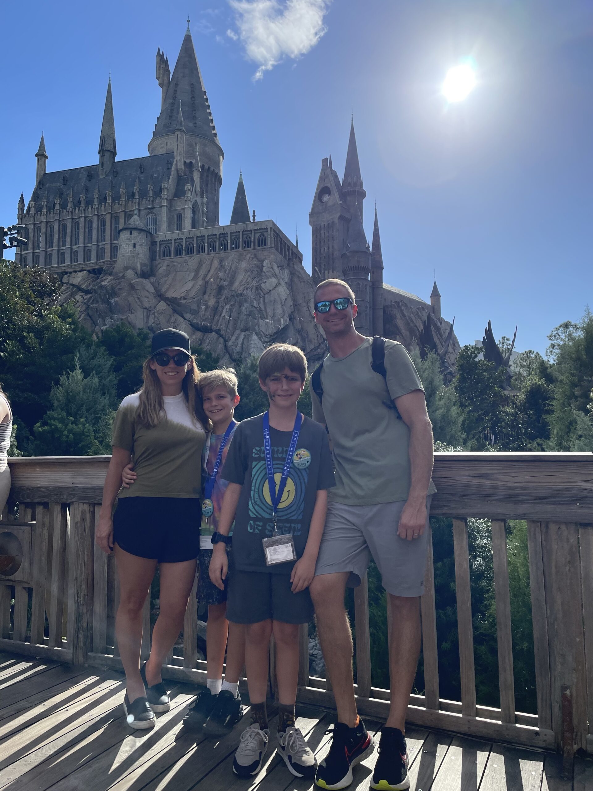 Dr. Brownfield, Husband Michael, and kids in front of Hogwarts castle at Universal Studios
