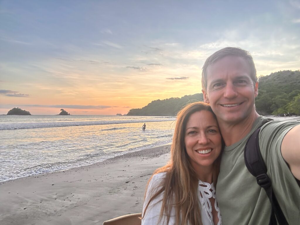 Dr. B and Michael on the beach at sunset